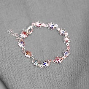 Pulsera con Mariquitas Multicolor Dorado