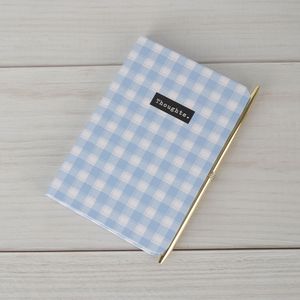Cuaderno A6 y Lapicero